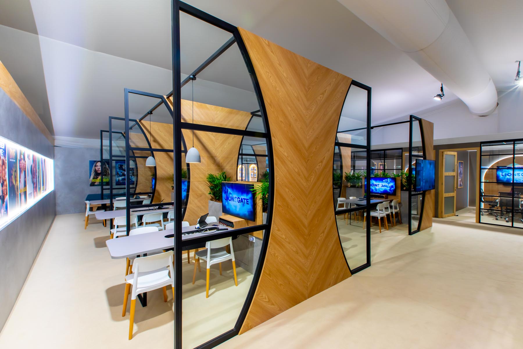 lionsgate-mipcom-2024-exhibition-13 Modern exhibition space with wooden accents