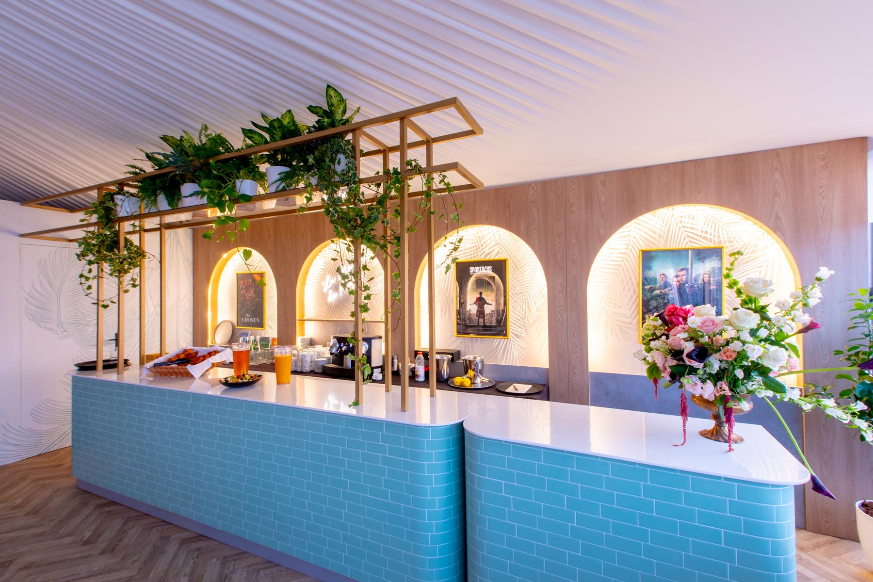 lionsgate-mipcom-2024-exhibition-30 Modern exhibition space with greenery decor