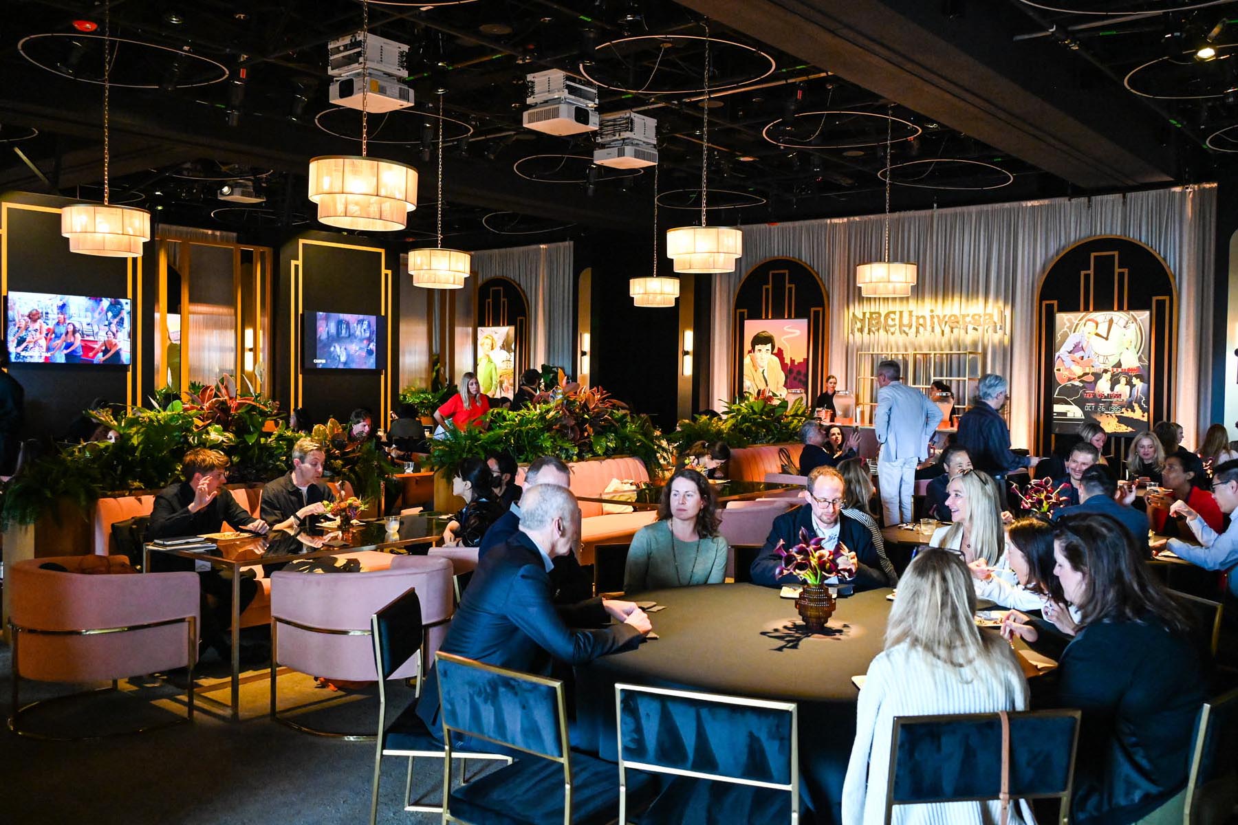nbcu-la-screenings-2026-event-interior-05 Elegant dining event with attendees socializing.
