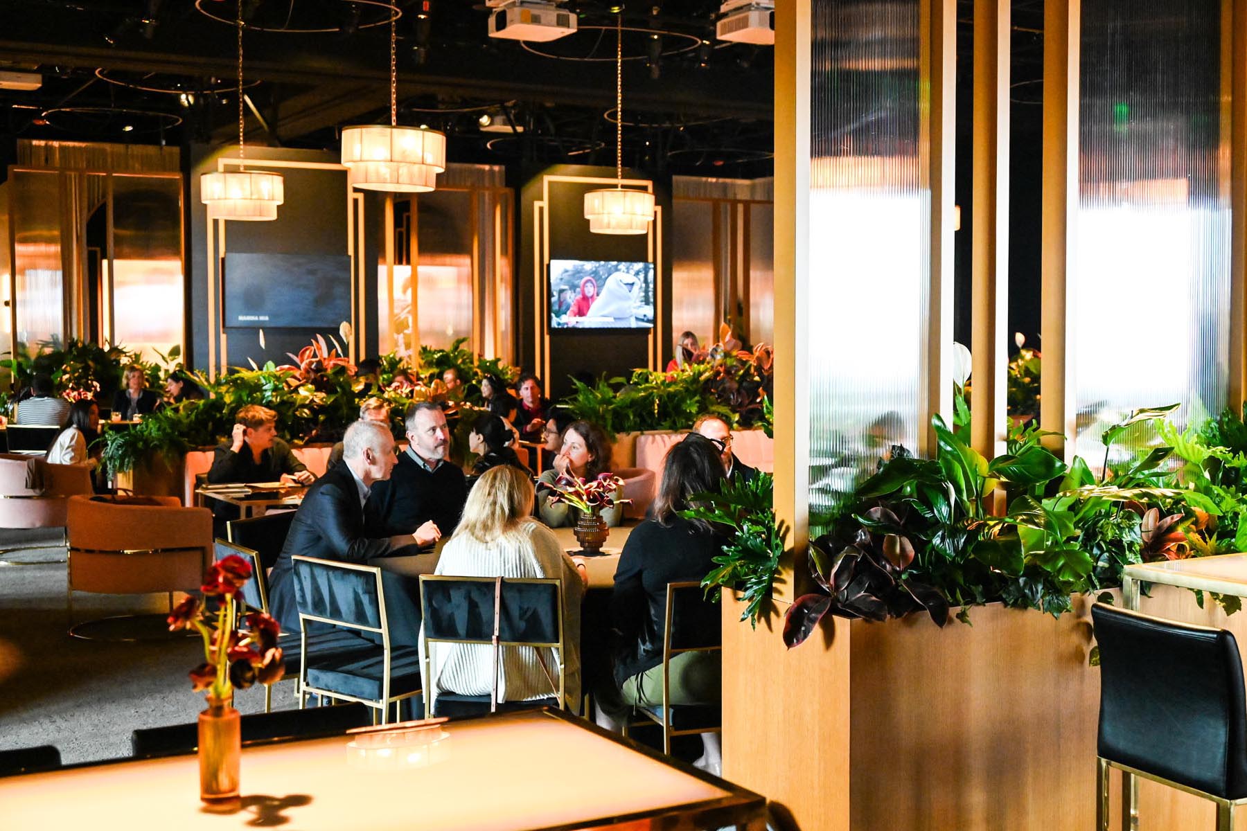 nbcu-la-screenings-2026-event-interior-06 Elegant restaurant interior with diners.