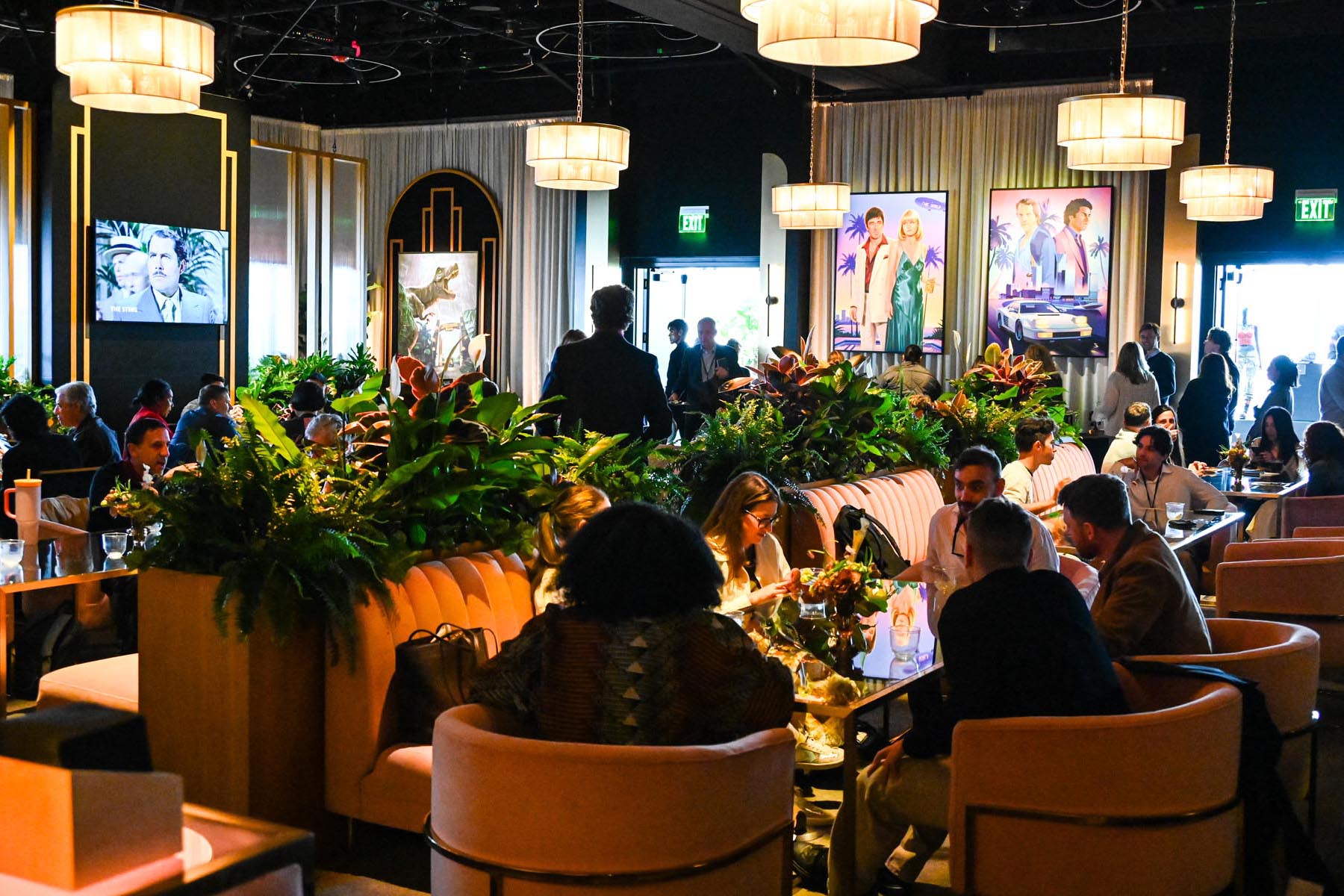 nbcu-la-screenings-2026-event-interior-08 Elegant restaurant with guests dining indoors.
